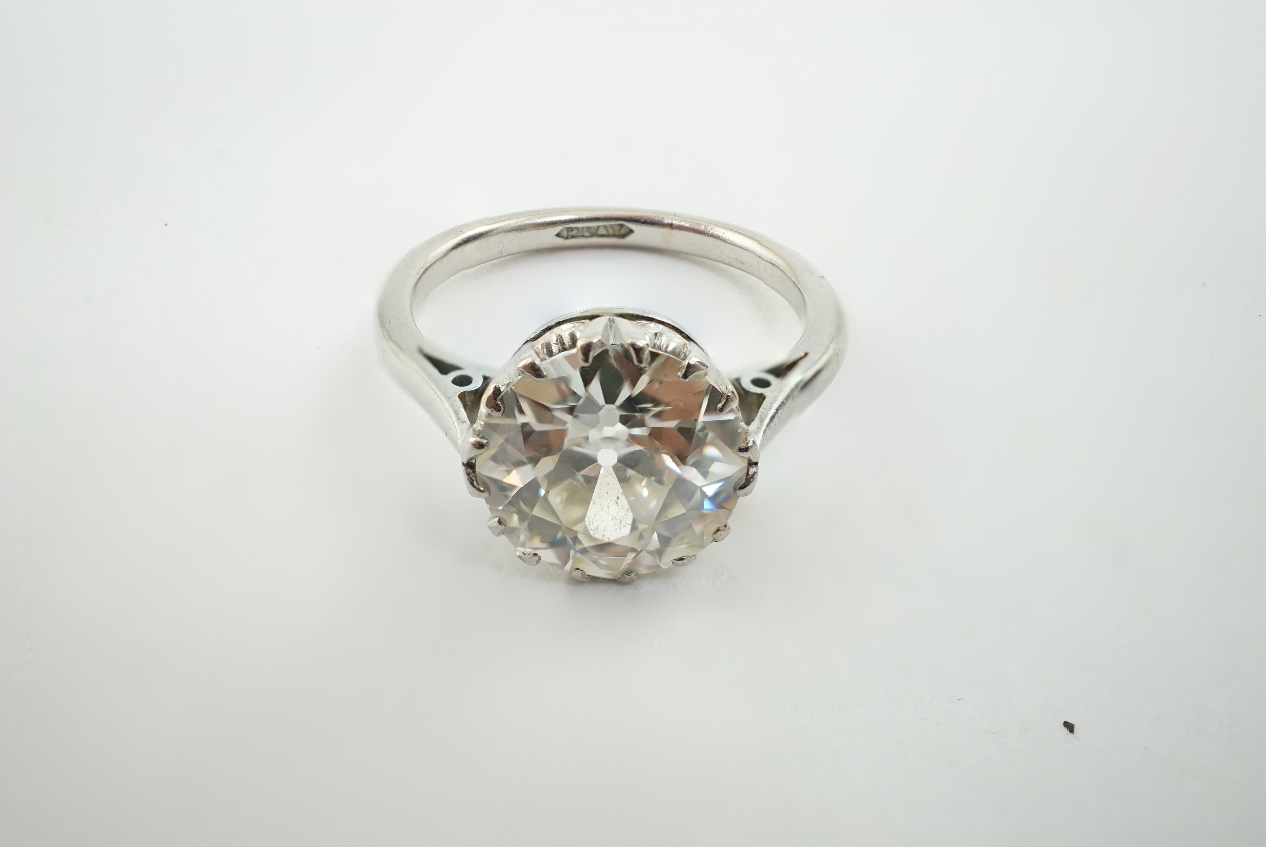 A platinum and solitaire diamond set ring